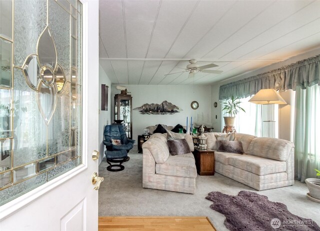 2101 S 324th St Unit 136, Federal Way, WA 98003 - living room with a ceiling fan and wood finished floors