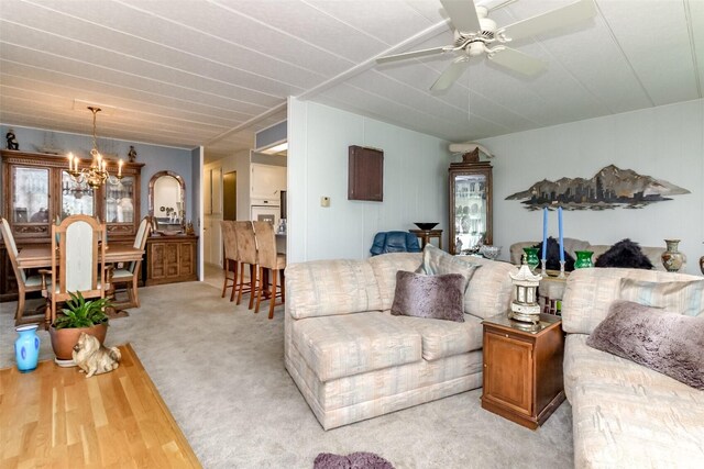 2101 S 324th St Unit 136, Federal Way, WA 98003 - living room with a chandelier, ceiling fan, and wood finished floors