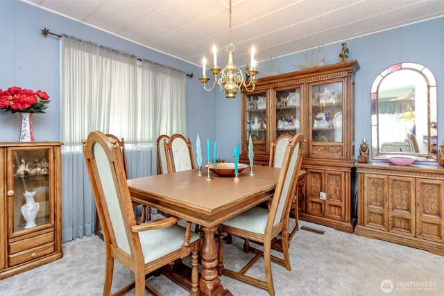 2101 S 324th St Unit 136, Federal Way, WA 98003 - dining room featuring light colored carpet and a chandelier