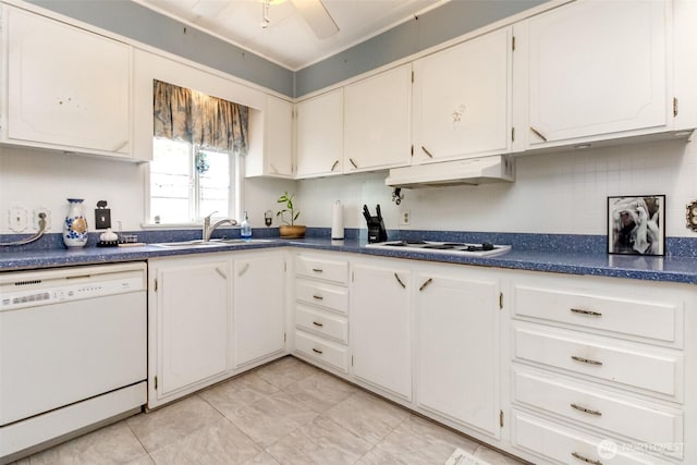 2101 S 324th St Unit 136, Federal Way, WA 98003 - kitchen with white dishwasher, a sink, under cabinet range hood, dark countertops, and white cabinets