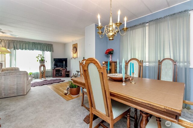 2101 S 324th St Unit 136, Federal Way, WA 98003 - dining space featuring a chandelier