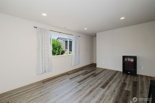 2450 Zeeden Way, Bremerton, WA 98310 - spare room featuring wood finished floors, recessed lighting, and heating unit
