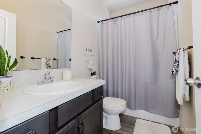2450 Zeeden Way, Bremerton, WA 98310 - full bath with wood finished floors, vanity, and toilet