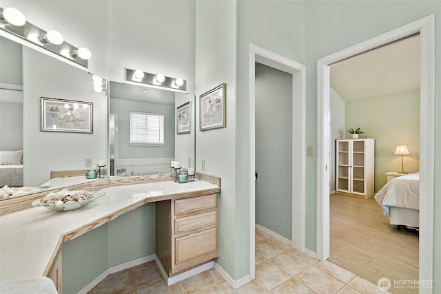 12015 SE 312th Pl Unit 7D, Auburn, WA 98092 - full bath featuring ensuite bath, vanity, and tile patterned floors