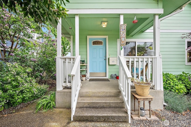 1027 S 60th St, Tacoma, WA 98408 - doorway to property featuring a porch