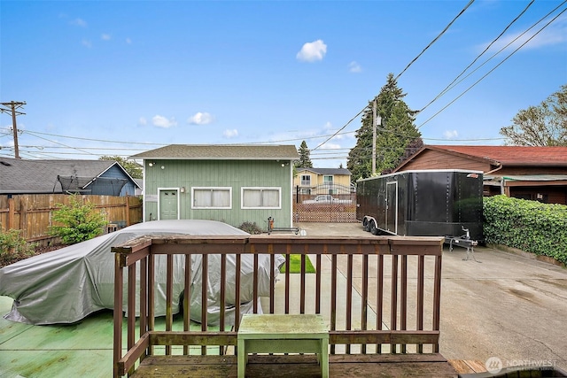 1027 S 60th St, Tacoma, WA 98408 - deck featuring fence, a patio, and a sunroom