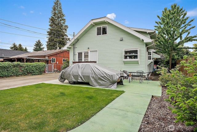1027 S 60th St, Tacoma, WA 98408 - back of property with a patio