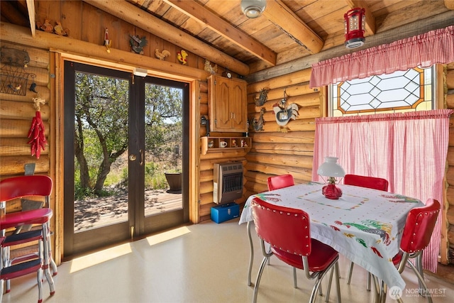 6530 Colockum Rd, Ellensburg, WA 98926 - dining room with wood ceiling with exposed beams, rustic walls, heating unit, and french doors