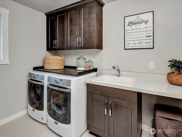 11550 174th Ave NE, Redmond, WA 98052 - laundry room featuring cabinet space, washing machine and dryer, and baseboards