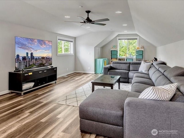11550 174th Ave NE, Redmond, WA 98052 - living area with lofted ceiling, wood finished floors, a ceiling fan, baseboards, and recessed lighting