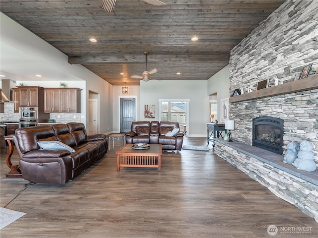 2611 Paisley St SE, East Wenatchee, WA 98802 - living area with recessed lighting, wood ceiling, dark wood-type flooring, baseboards, and a fireplace