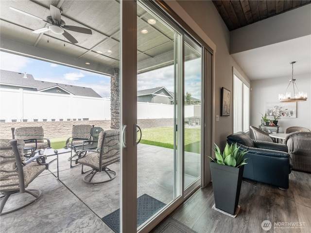 2611 Paisley St SE, East Wenatchee, WA 98802 - doorway to outside featuring dark wood-type flooring, a chandelier, ceiling fan, and recessed lighting