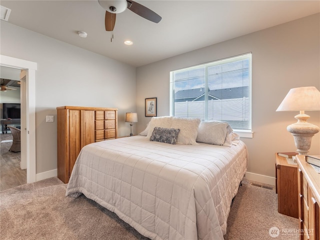 2611 Paisley St SE, East Wenatchee, WA 98802 - bedroom with carpet, baseboards, and a ceiling fan