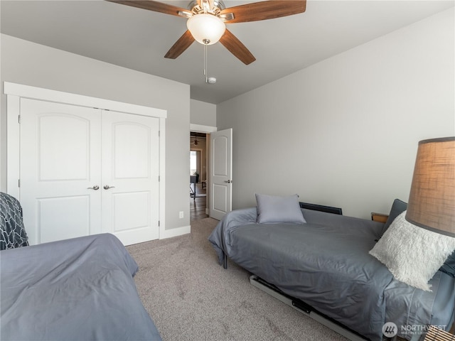 2611 Paisley St SE, East Wenatchee, WA 98802 - carpeted bedroom featuring a closet, ceiling fan, and baseboards