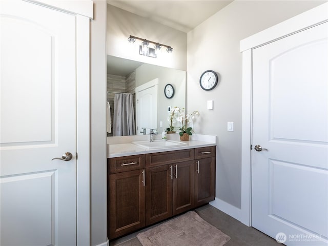 2611 Paisley St SE, East Wenatchee, WA 98802 - bathroom featuring vanity, tile patterned floors, and baseboards