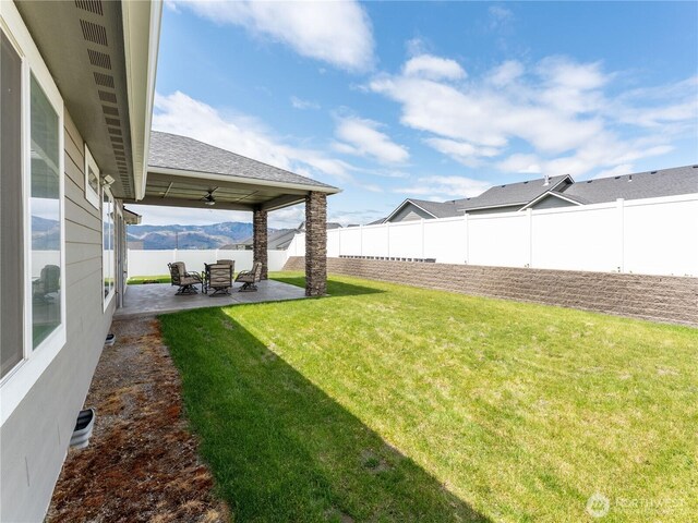 2611 Paisley St SE, East Wenatchee, WA 98802 - view of yard with a patio and a ceiling fan