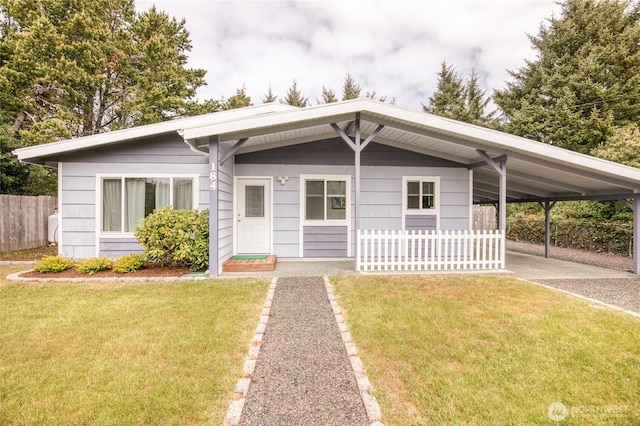 184 Frigate St NW, Ocean Shores, WA 98569 - view of front of home with a carport and driveway