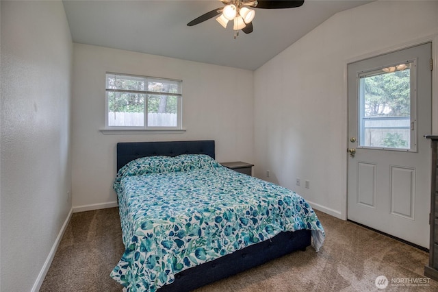 184 Frigate St NW, Ocean Shores, WA 98569 - carpeted bedroom with multiple windows, vaulted ceiling, baseboards, and ceiling fan