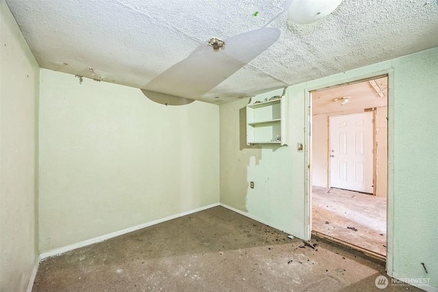 3122 Oas Dr W, University Place, WA 98466 - spare room featuring a textured ceiling and baseboards