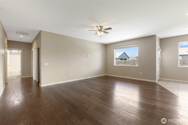 546 S Driftwood Ln, Moses Lake, WA 98837 - empty room with ceiling fan, wood finished floors, and baseboards