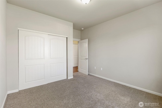 546 S Driftwood Ln, Moses Lake, WA 98837 - unfurnished bedroom with carpet floors, baseboards, and a closet