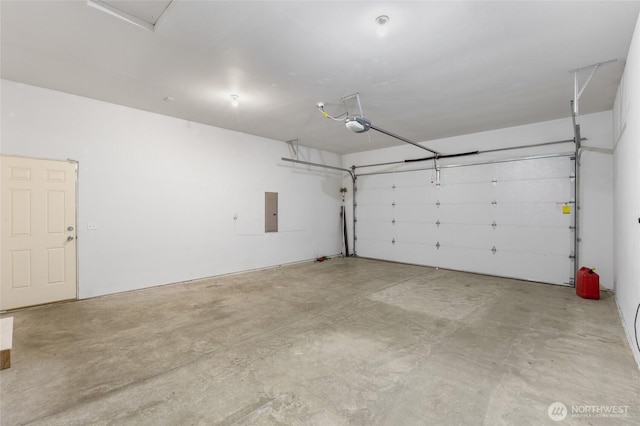 546 S Driftwood Ln, Moses Lake, WA 98837 - garage featuring a garage door opener and electric panel