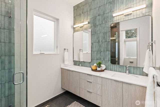 2925 Franklin Ave E Unit B, Seattle, WA 98102 - bathroom with a stall shower, tile patterned flooring, double vanity, and baseboards