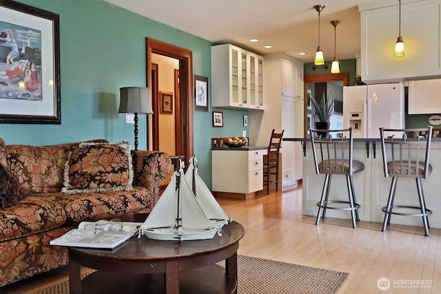 5066 Bayview Rd, Langley, WA 98260 - living room featuring light wood-style flooring and recessed lighting
