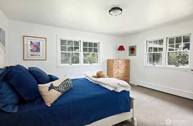 5066 Bayview Rd, Langley, WA 98260 - carpeted bedroom with a baseboard radiator