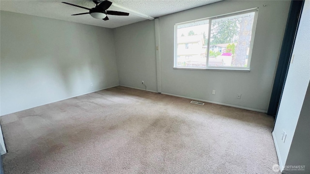 3732 S 254th Pl, Kent, WA 98032 - carpeted spare room with ceiling fan, a textured ceiling, and baseboards