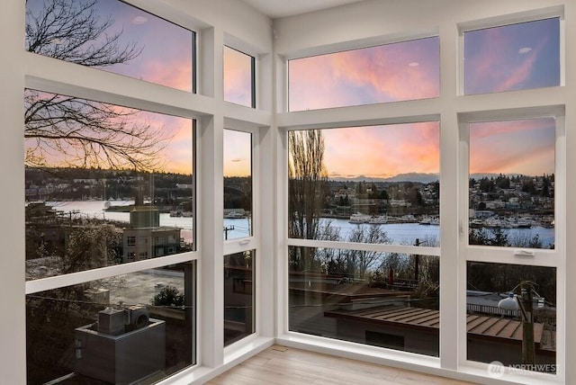 sunroom with a water view