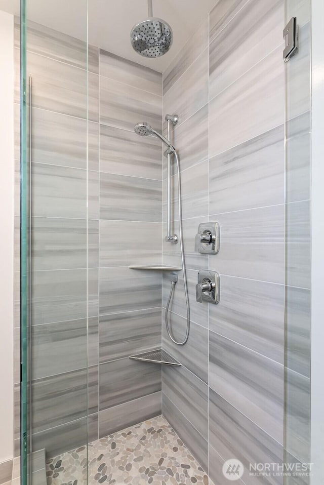 bathroom featuring a stall shower