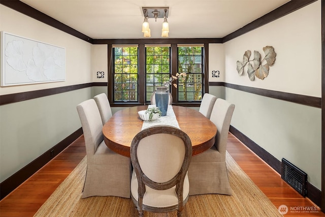 3227 37th Ave S, Seattle, WA 98144 - dining space with baseboards and wood finished floors