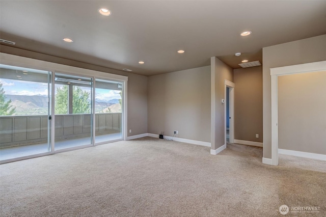 1400 Westpoint Pl, Wenatchee, WA 98801 - empty room featuring light carpet, baseboards, recessed lighting, and a smoke detector