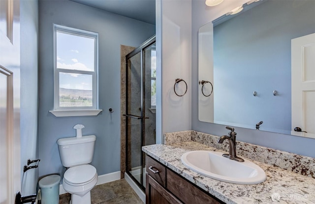 1400 Westpoint Pl, Wenatchee, WA 98801 - bathroom featuring toilet, vanity, healthy amount of natural light, and a shower stall