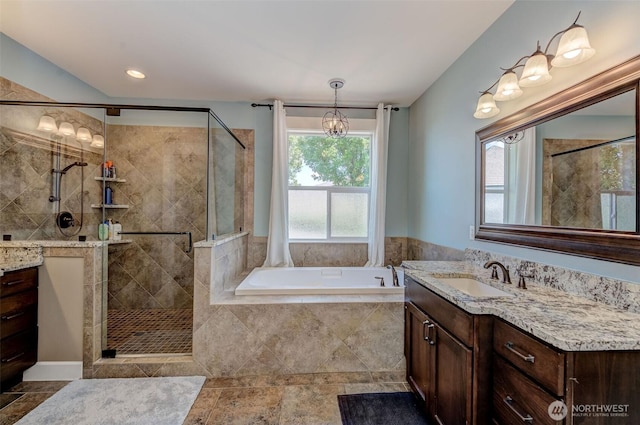 1400 Westpoint Pl, Wenatchee, WA 98801 - bathroom with vanity, a garden tub, and a shower stall