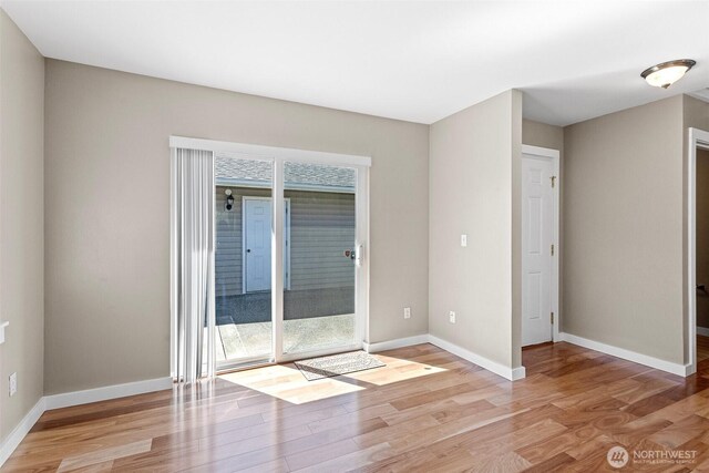 901 E Marine View Dr Unit 201, Everett, WA 98201 - unfurnished room featuring light wood-type flooring and baseboards