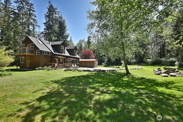 3425 Passage Way, Langley, WA 98260 - view of grassy yard featuring an outbuilding and a porch