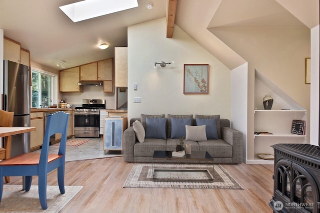 3425 Passage Way, Langley, WA 98260 - living area featuring a skylight and light wood-style flooring