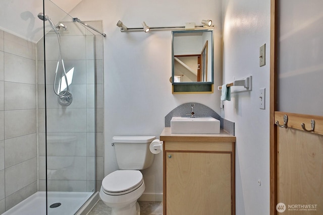 3425 Passage Way, Langley, WA 98260 - bathroom featuring vanity, toilet, and a tile shower
