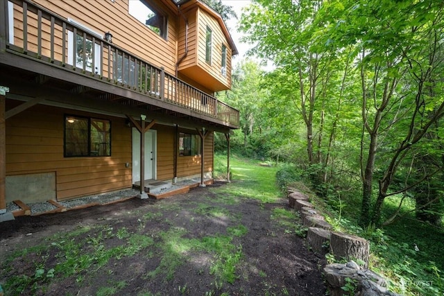 view of yard featuring a deck