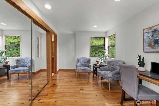 8526 E Mercer Way, Mercer Island, WA 98040 - living area with healthy amount of natural light, recessed lighting, and light wood finished floors