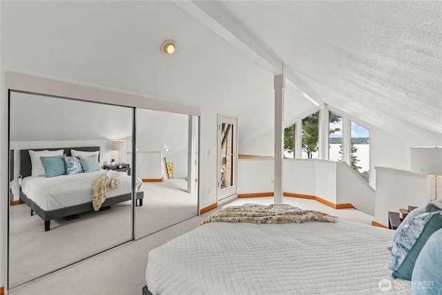 8526 E Mercer Way, Mercer Island, WA 98040 - bedroom with lofted ceiling, carpet floors, and a water view