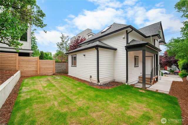 118 16th Ave, Seattle, WA 98122 - view of property exterior with a shingled roof and entry steps