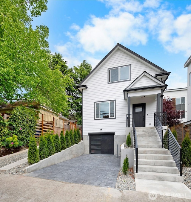 118 16th Ave, Seattle, WA 98122 - view of front of home featuring decorative driveway and an attached garage