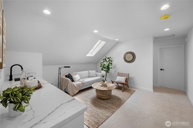 118 16th Ave, Seattle, WA 98122 - living room featuring a skylight, recessed lighting, vaulted ceiling, and light carpet
