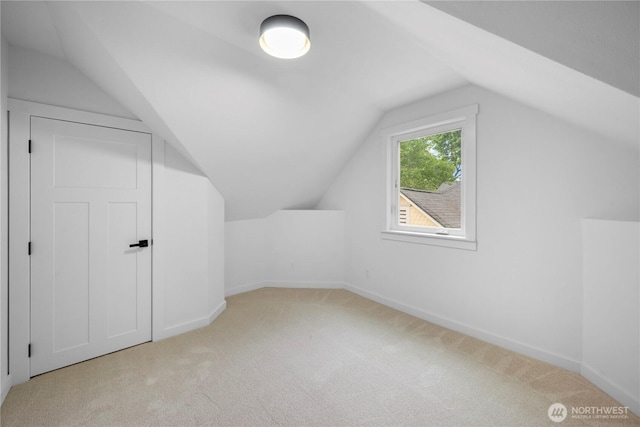 118 16th Ave, Seattle, WA 98122 - additional living space with carpet floors, lofted ceiling, and baseboards