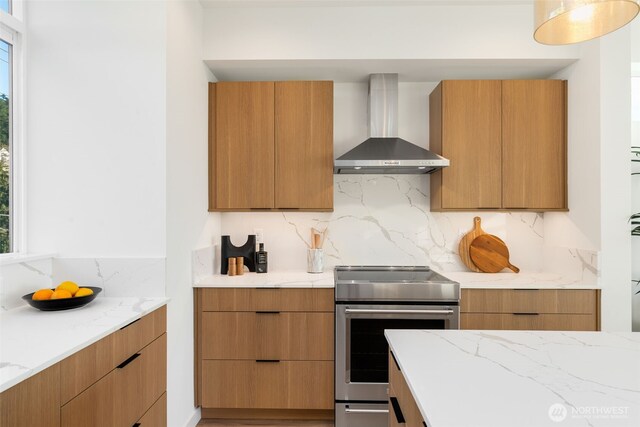 3831 59th Ave SW, Seattle, WA 98116 - kitchen with wall chimney exhaust hood, stainless steel electric stove, and modern cabinets