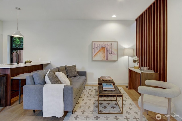 3816B 36th Ave W, Seattle, WA 98199 - living area featuring recessed lighting, light wood-style flooring, and baseboards