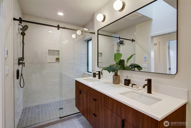 3816B 36th Ave W, Seattle, WA 98199 - bathroom featuring a shower stall, double vanity, and tile patterned flooring